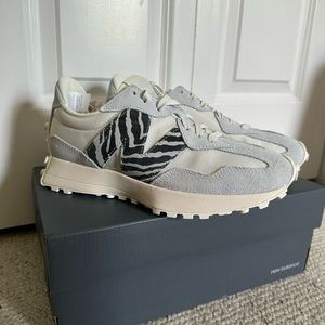 New Balance 327 sneakers in pastel blue and zebra